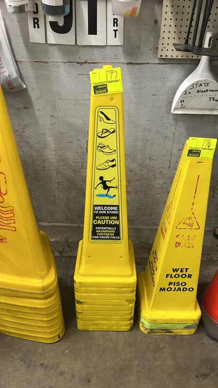 Poly wet floor safety caution cones. Features stackable four-sided polyethylene construction in yellow with hazardous footwear caution warnings.