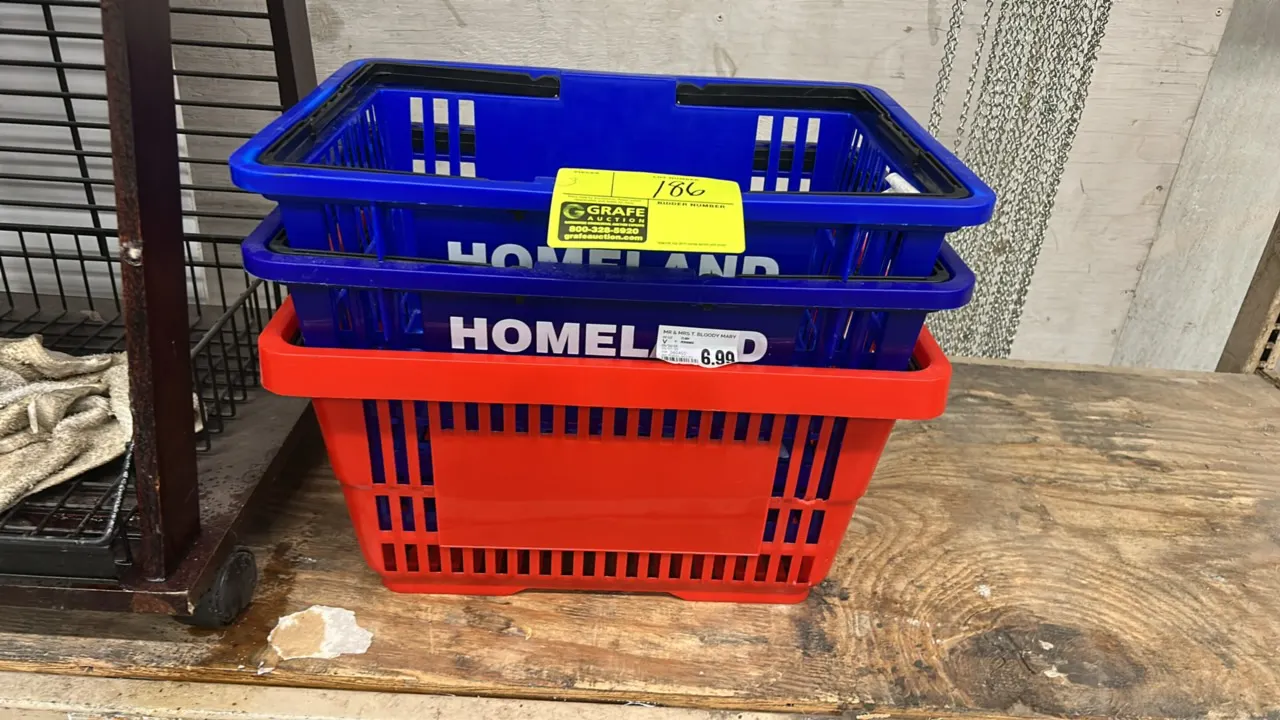 Poly shopping baskets. Features dual folding handles, slotted sides and bottom, and stackable design. Includes blue and red baskets. 17"L.