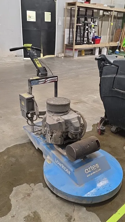 Aztec LowRider propane floor burnisher. Powered by a PurePower 603cc low-emission propane engine. Features a low-profile deck, adjustable operator han