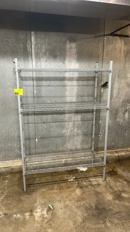 Metal wire shelving racks. Features 3-tier wire shelves with metal upright posts. 48"W x 20"D. Contents not included.