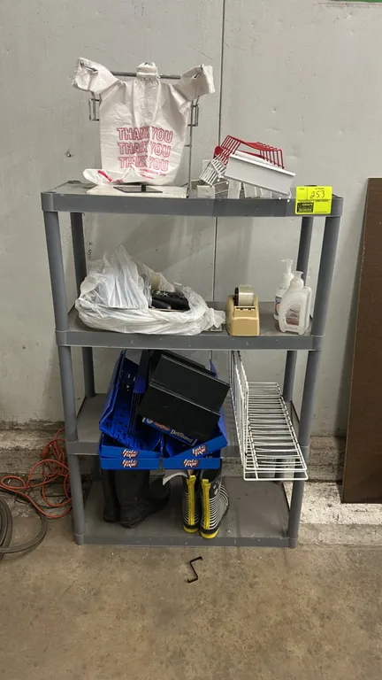 Poly 4-tier shelving rack. Features molded plastic construction with four shelves. Dimensions: 36"W x 14"D. Contents not included.
