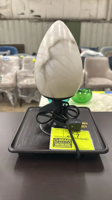 Alberi di Toscana Cypress table lamp. Features a carved alabaster cypress-form shade, dark wood square tray base, and in-line cord switch. Made in Ita