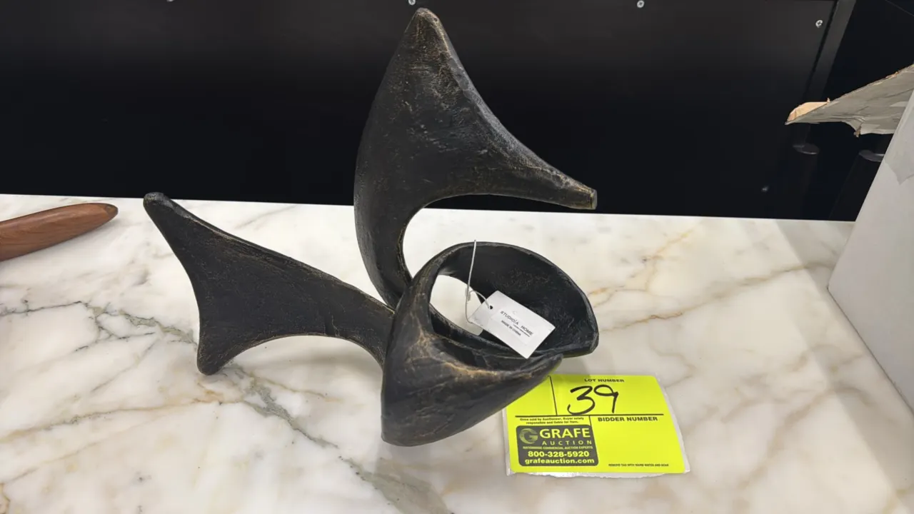A Studio A Home "Strombus" Bronze Sculpture. (Studio A Home / Global Views) An abstract decorative sculpture inspired by the organic form of a strombu