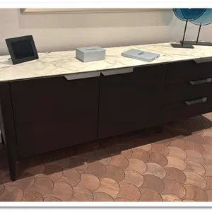 Porada Atlante sideboard. Features a solid stone top, two cabinet doors, and three drawers with horizontal pulls. Dark wood finish on tapered legs. 83