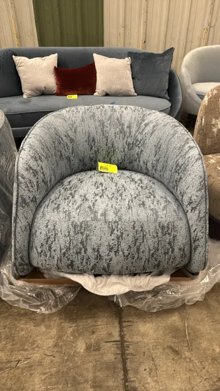 Bernhardt Design 6180 upholstered rocking chair. Features a curved barrel-back silhouette with Métaphores Spuma fabric upholstery in Ardoise. Mounted