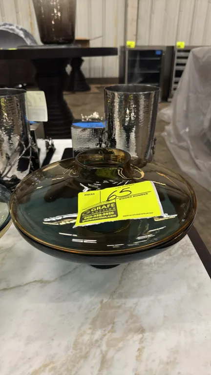 Global Views low glass vase. Features amber over cobalt glass construction with a footed pedestal base. 12"Dia.