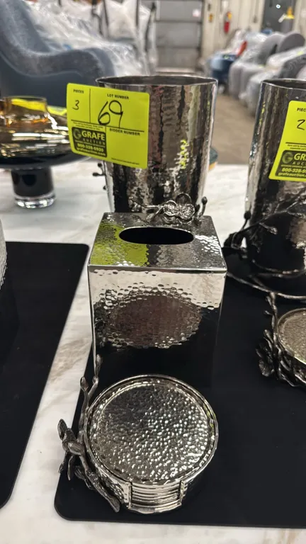 Michael Aram Black Orchid decorative tabletop accessories. Lot includes a medium vase, tissue box cover, and a coaster set with holder. Features hamme