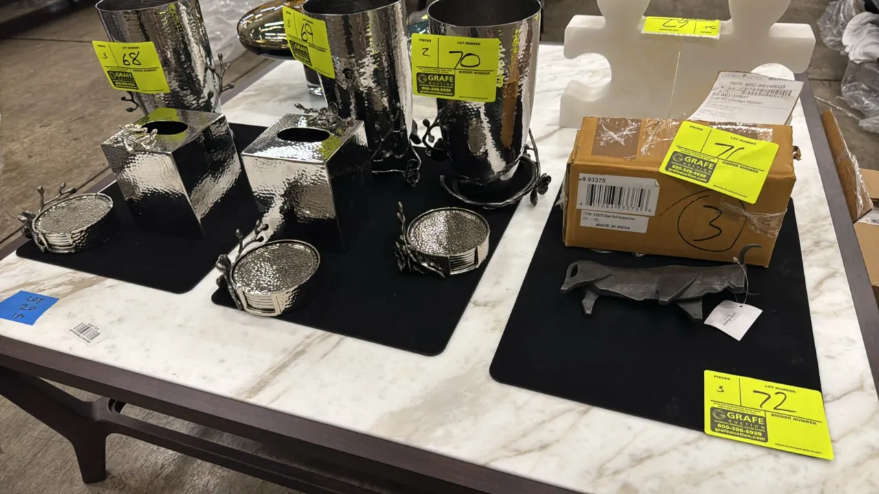 Nekmit display mats. Features black finish with rounded corners and embossed logo. 17" x 12". Contents not included.