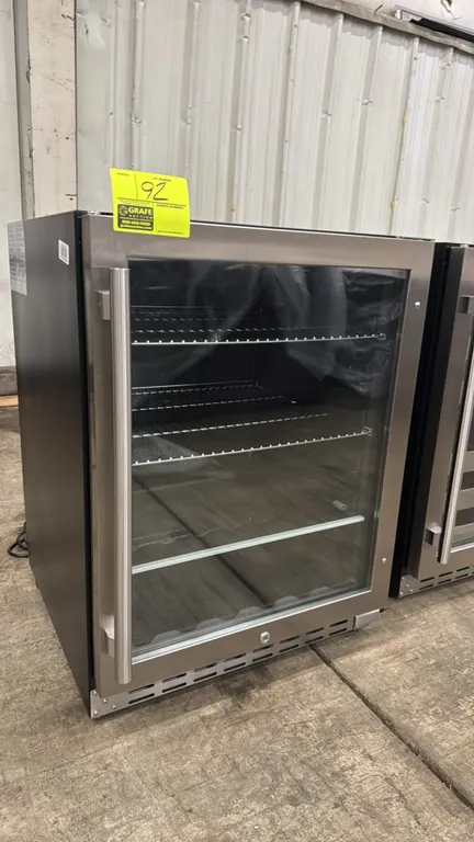 2024 Summit ALBV2466 self-contained beverage cooler. Features a stainless steel framed glass display door, interior LED lighting, digital temperature