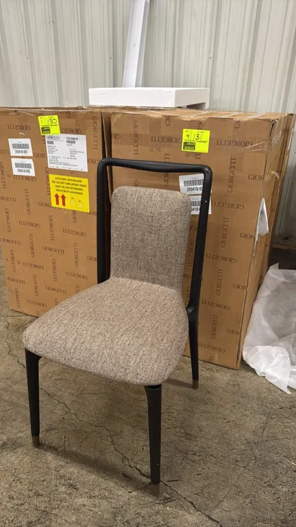 Giorgetti 9580 Ibla upholstered dining chairs. Features solid ash wood frame in Frassino Grigio antracite finish, Chivasso Gentle Soul fabric upholste