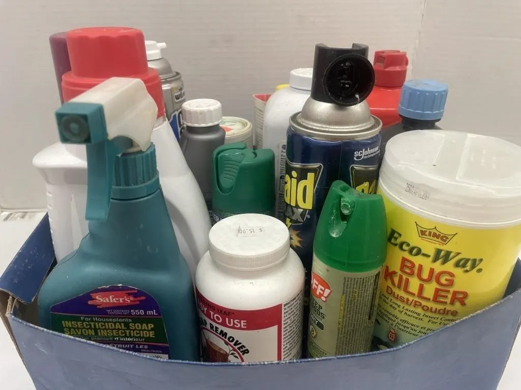 Open containers of gardening chemicals and bug