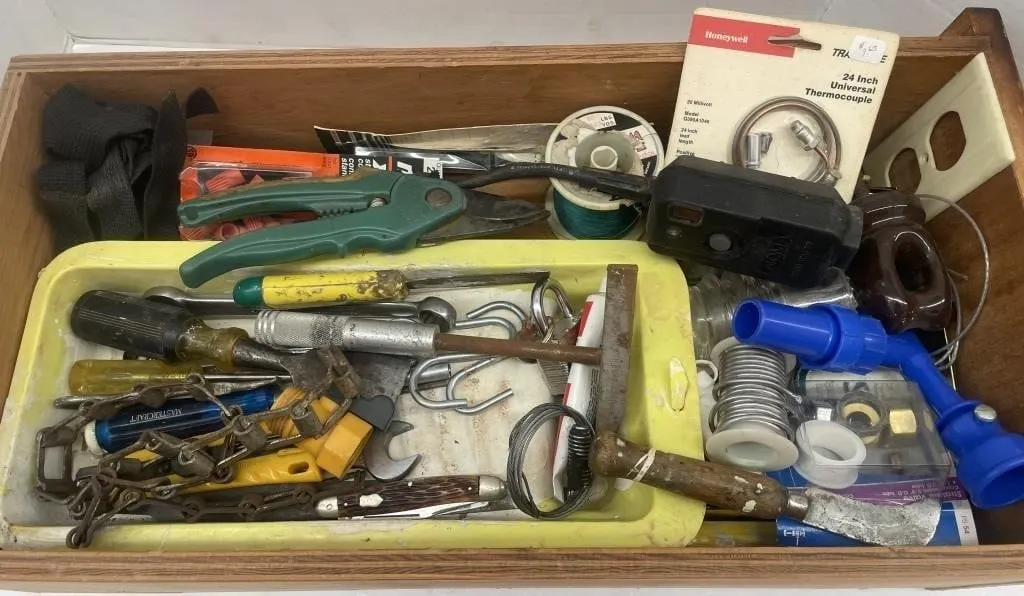 Miscellaneous hand tools and hardware. Includes