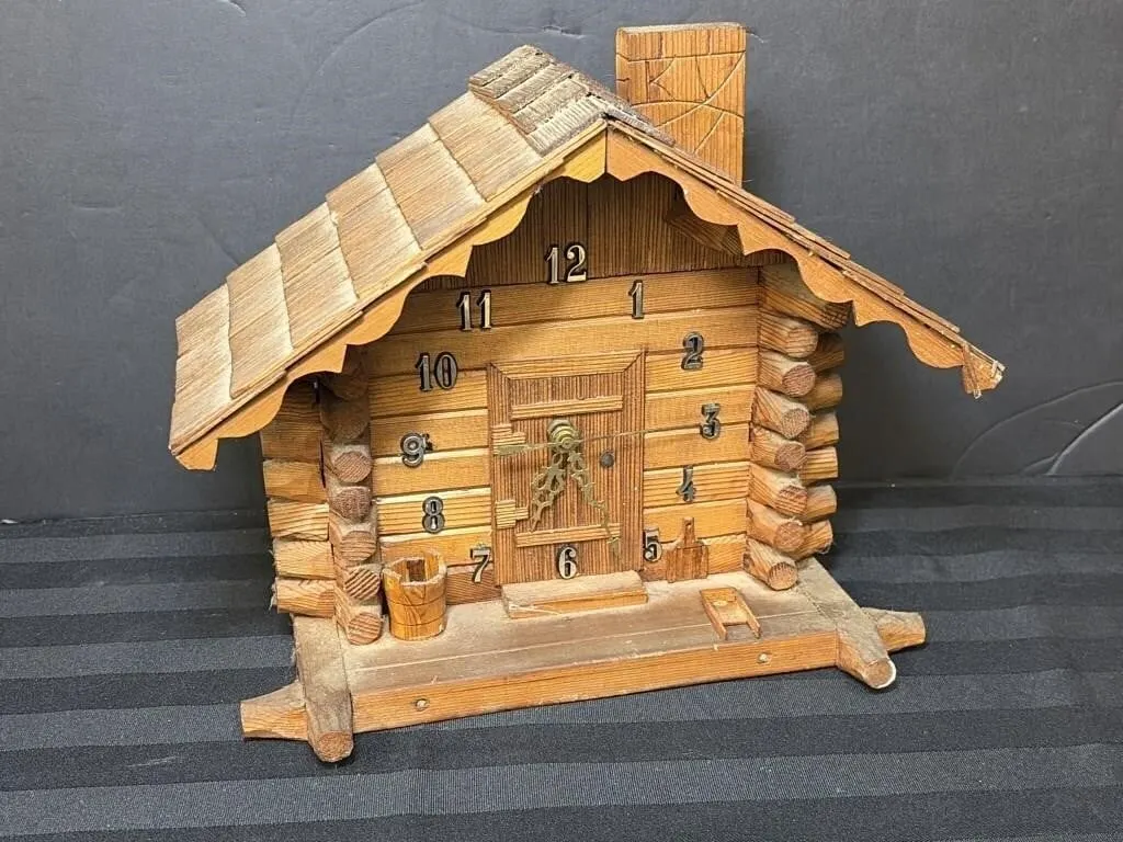 Vintage handmade wooden log cabin clock