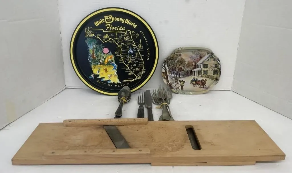 Two souvenir trays, a 20� cabbage shredder, and