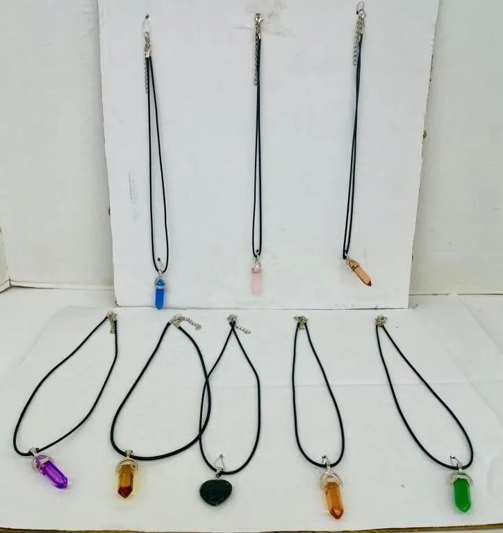 Eight-pack of crystal necklaces. various colours.