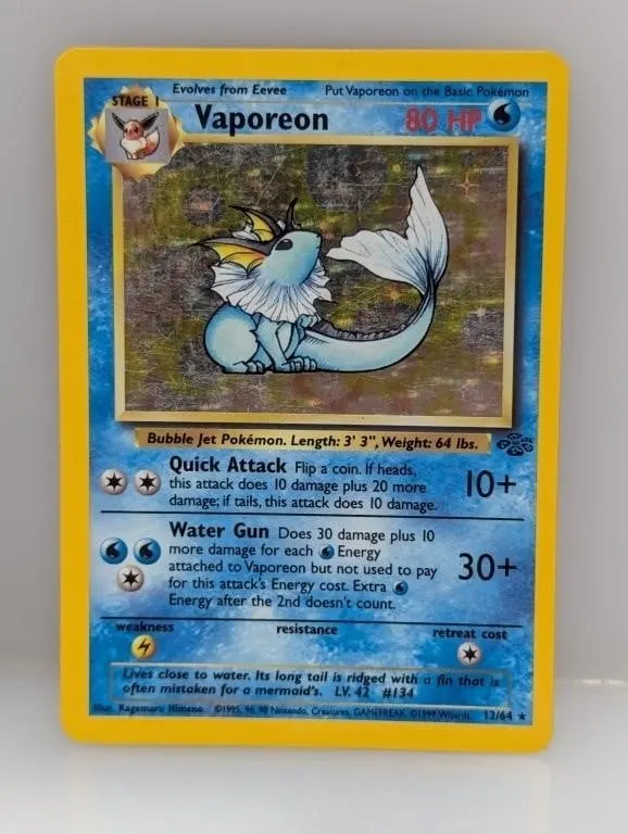Pokemon 1999 Vaporeon Holo 12 Crease/Scratches