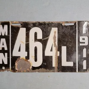 1911 Porcelain Manitoba Motorcycle License Plate