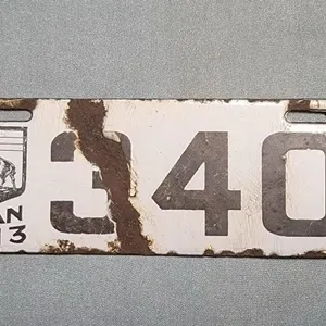 1913 Porcelain Manitoba Motorcycle License Plate