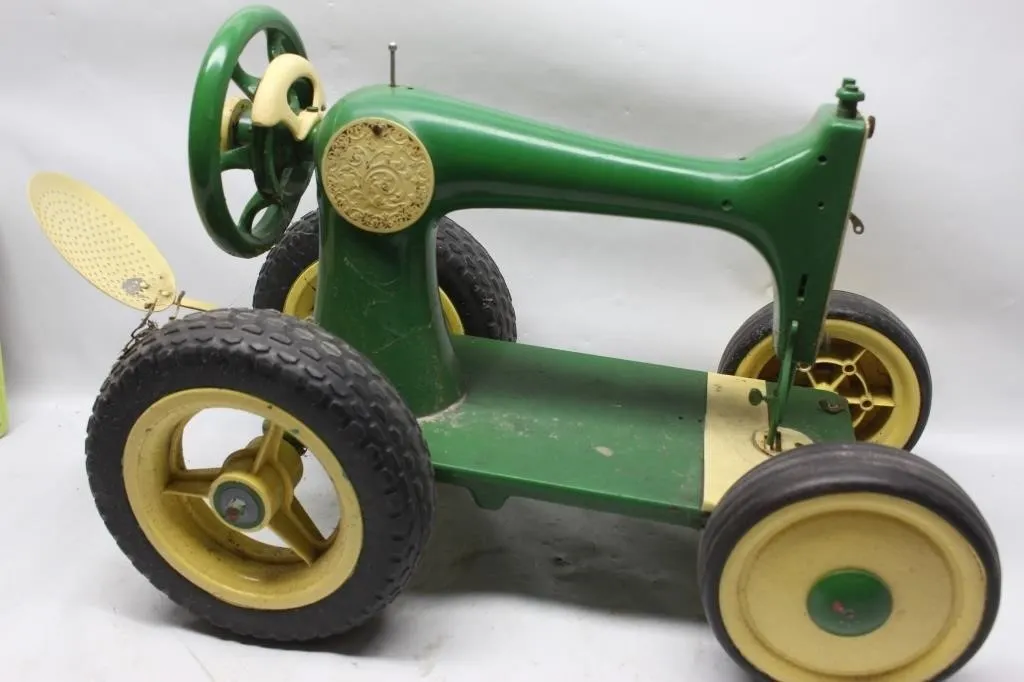 Green Sewing Machine on Pedal Tractor Wheels
