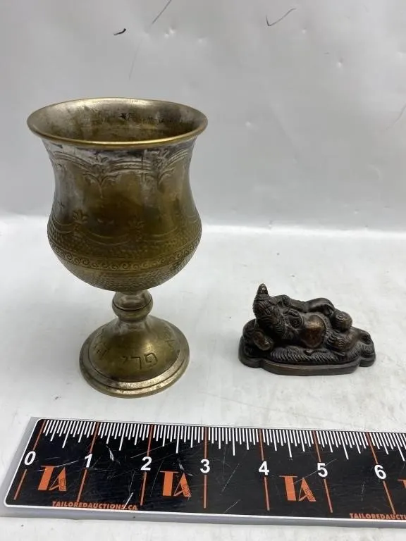 Brass Kiddush Cup and Reclining Ganesha Figurine