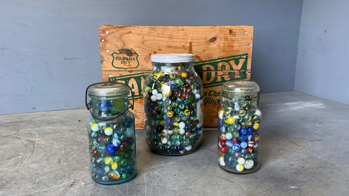 (3) Glass Jars of Assorted Marbles w/ Wooden Crate