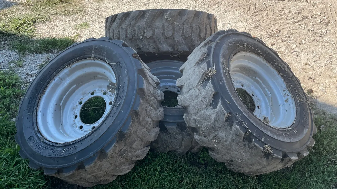 (4) Power King Tires on 8 Bolt Rims