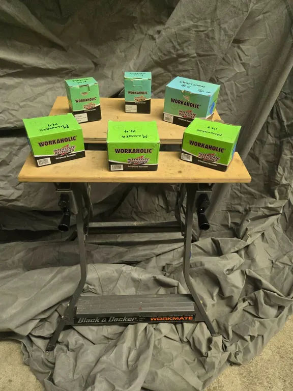 6 Workaholic Battery Packs and One Battery Charger