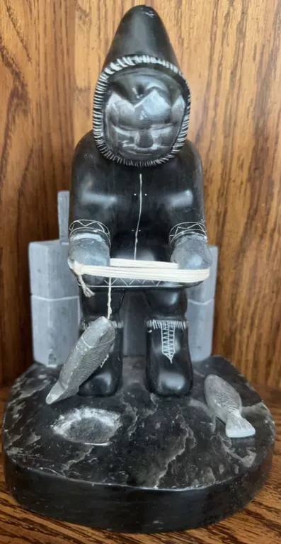 Soapstone Carving Signed by Harold Paulhus Fishing Inuit Figure