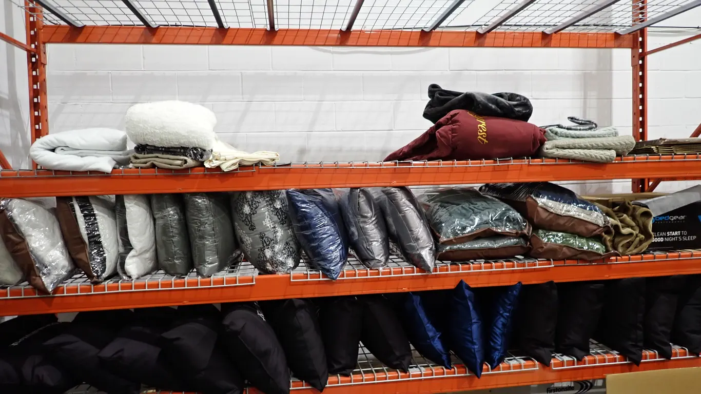 Lot of Asst. Size Display Blankets, Pillow Protectors and Branded Pillows.