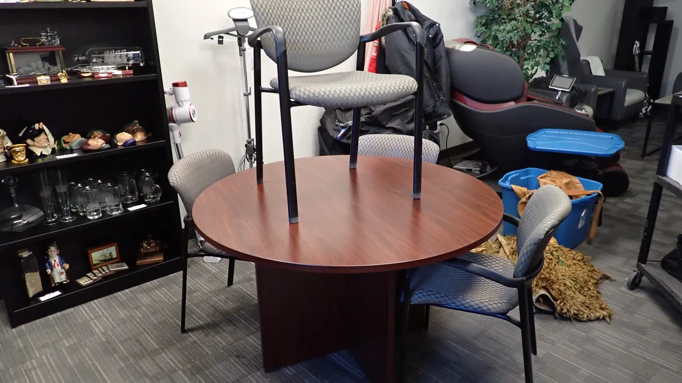 Lot of 48" Round Meeting Table and (4) Chairs.