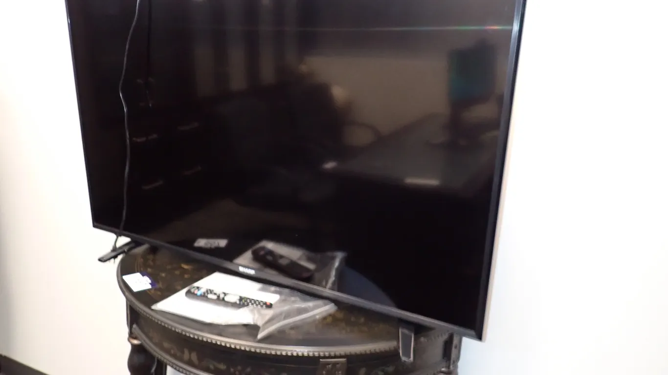 Sharp 50" Flatscreen Television w/Remote.