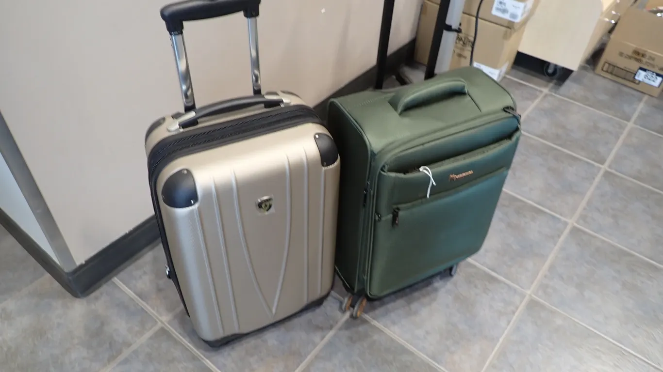 Lot of (2) Rolling Carry-On Suitcases.