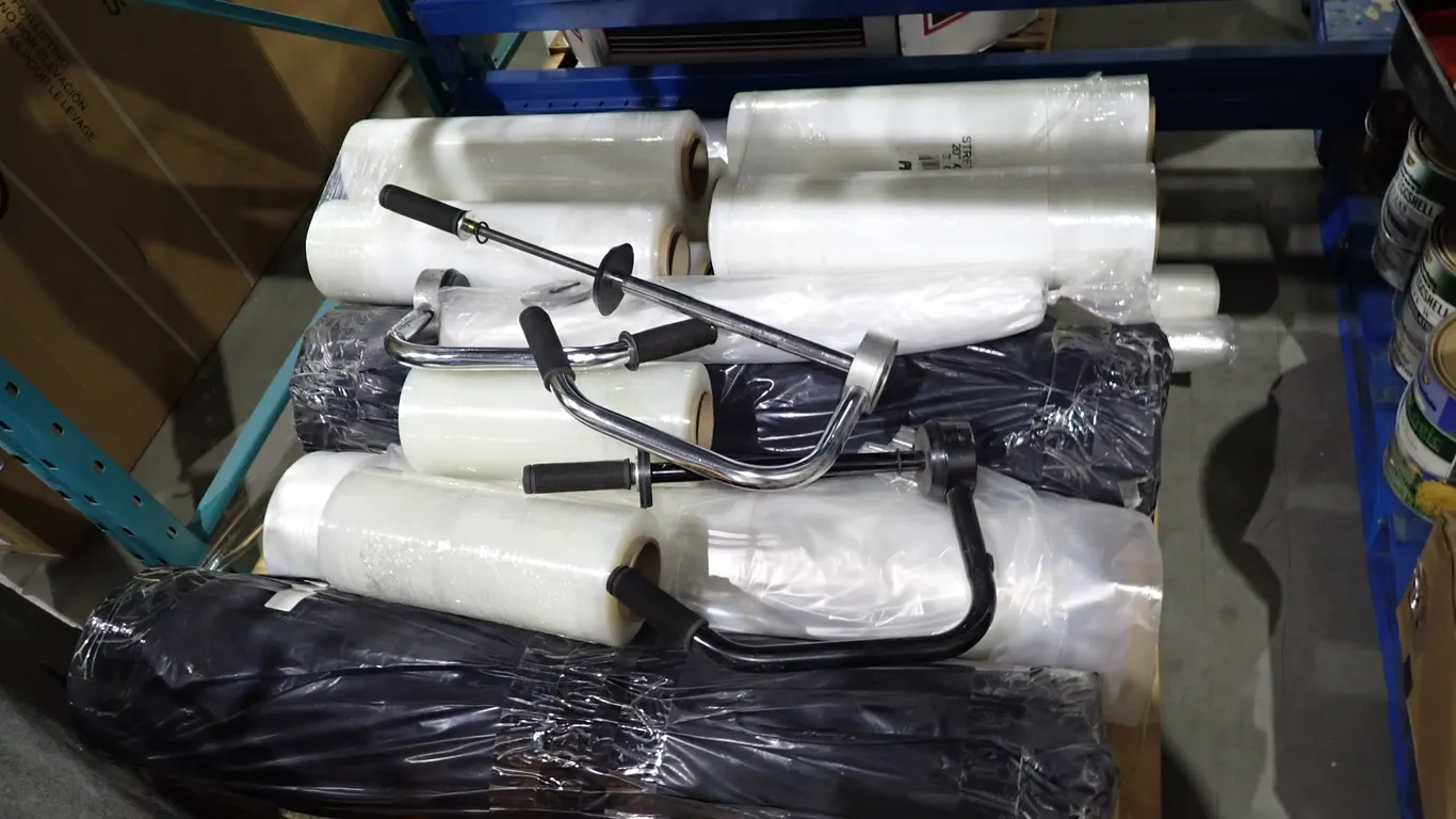 Lot of Shrink Wrap, Shrink Wrap Handles and (3) Rolls Plastic Sofa/Loveseat Furniture Bags.