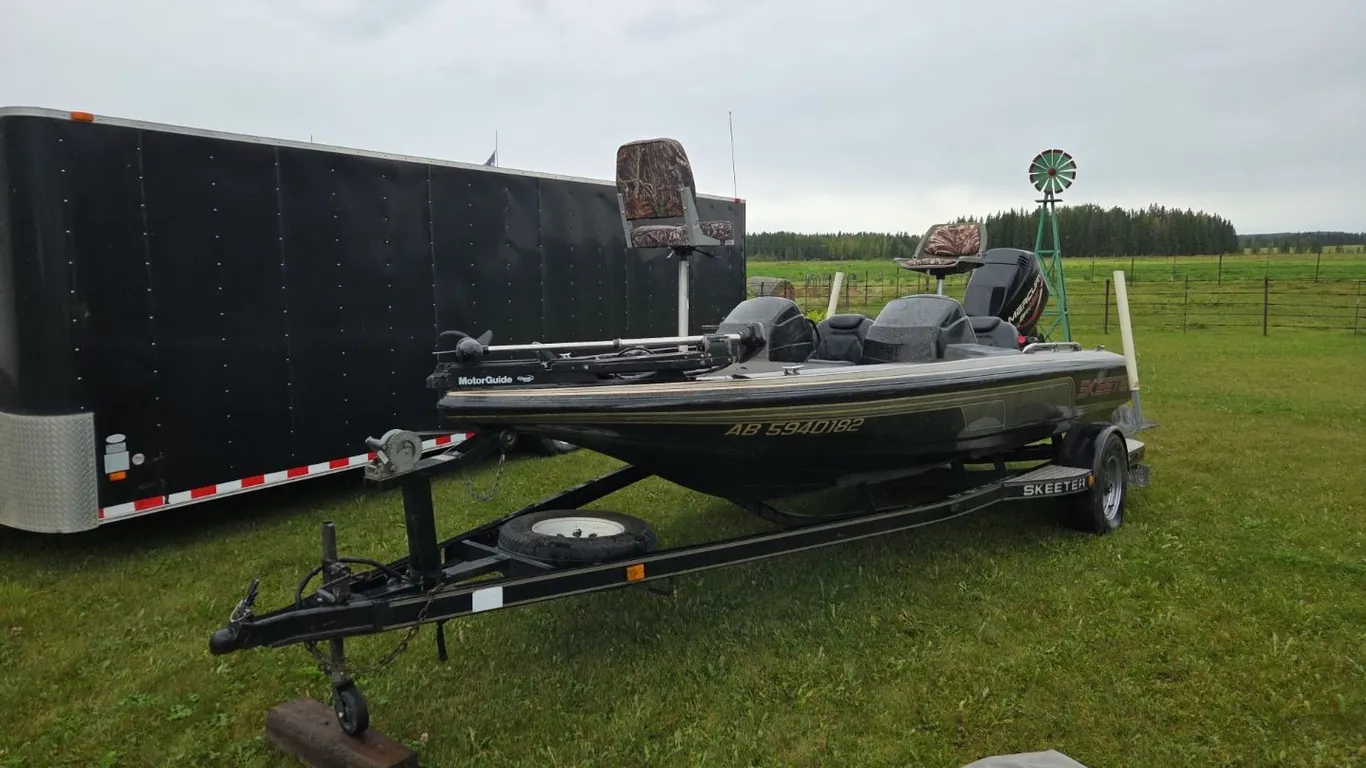 1998 Skeeter 18' Bass Boat on a 1998 Skeeter Single Axle Trailer. Boat VIN STE153171798, Trailer VIN 1L8FAEKA4WA023809