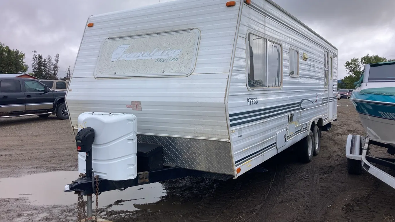 2003 Travelaire Rustler 28' Holiday Trailer VIN: 2TTRT26603R031642