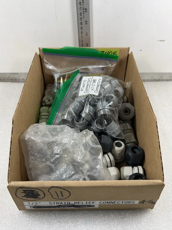 Box of 1/2" Straing Relief Connectors, approx. 46 pce *Unreserved*