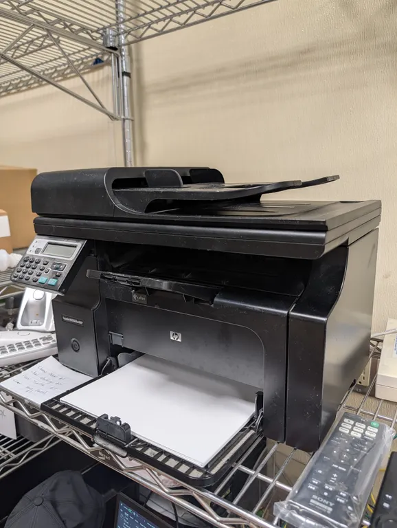 HP Laserjet Printer - Model # M1217 NFW MFP