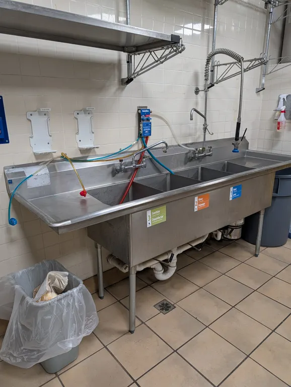 Duke 4 Compartment Sink with 2 Drain Boards and Mechanical Drains - 100" x 27" x 43.5" (Faucets Not