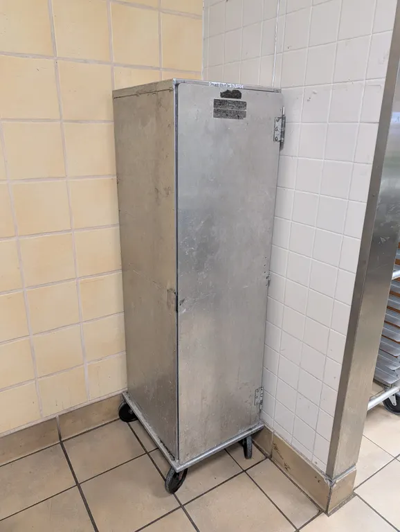 Enclosed 25 Pan Half Size Pan Rack on Casters - 16" X 19" X 59"
