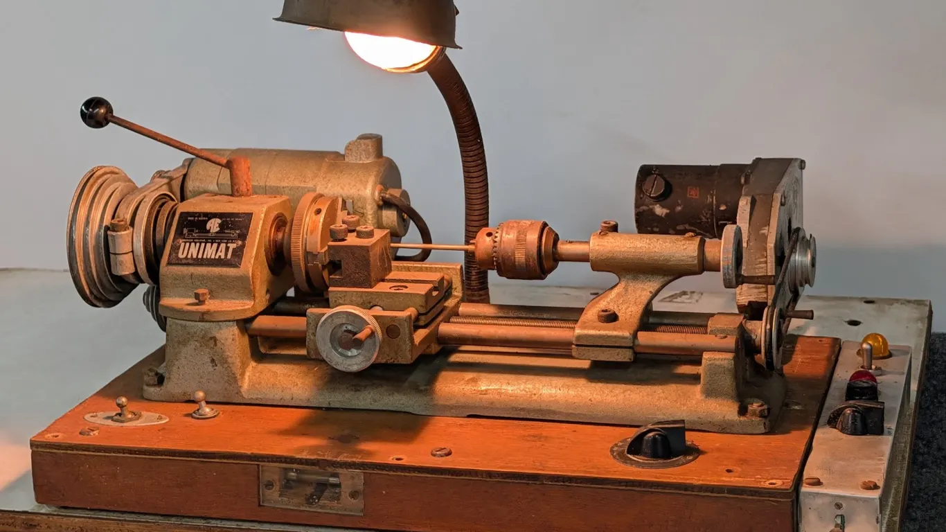 Vintage Unimat Miniature Metal Lathe with sliding mounted work station
