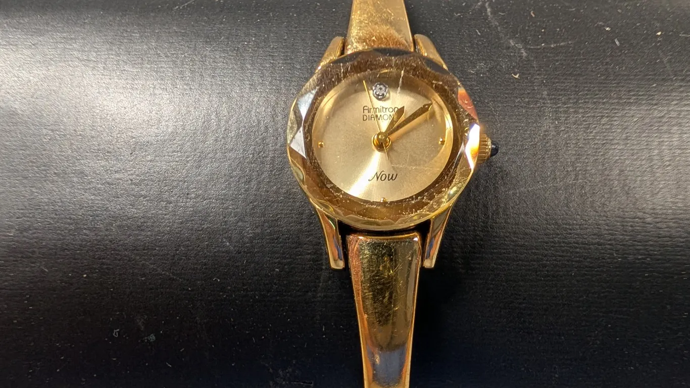 Armitron Diamond Accent "Now" Gold Tone Bangle Watch