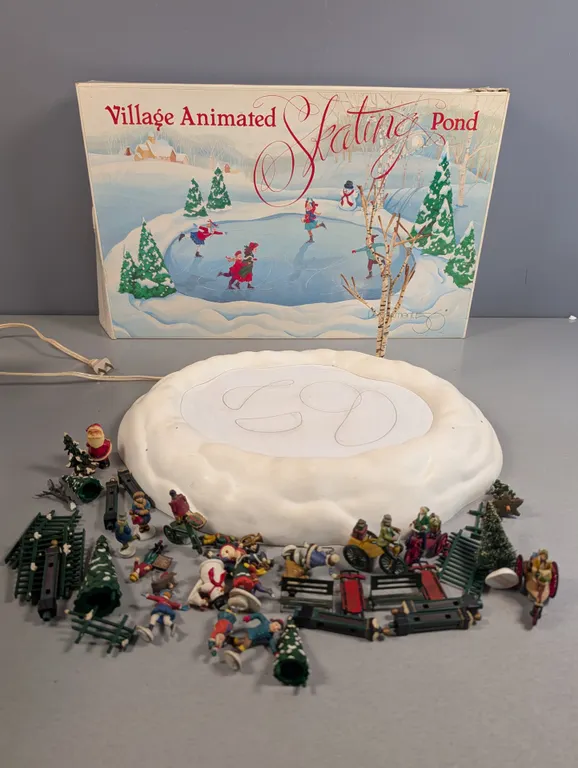 Department 56 Village Animated Skating Pond with Figures and Accessories and a Mr Christmas skating
