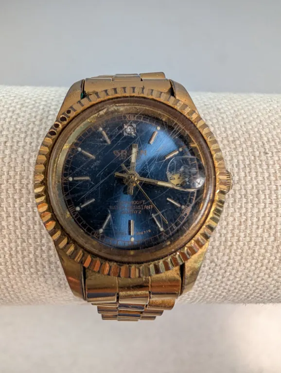 Gruen Gold Tone Quartz Wristwatch with Date