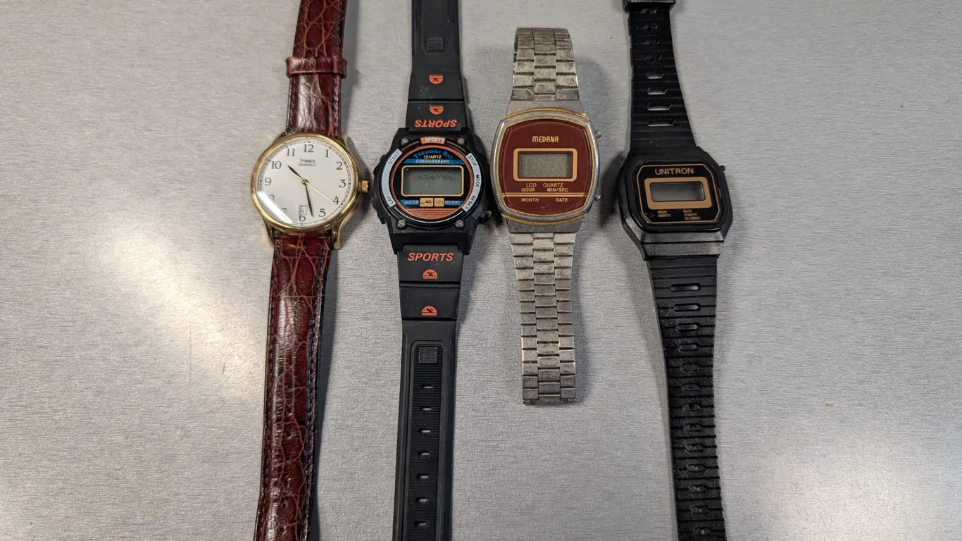 Collection of Four Vintage and Modern Watches: Timex, Medana, Unitron, and Sports Brand