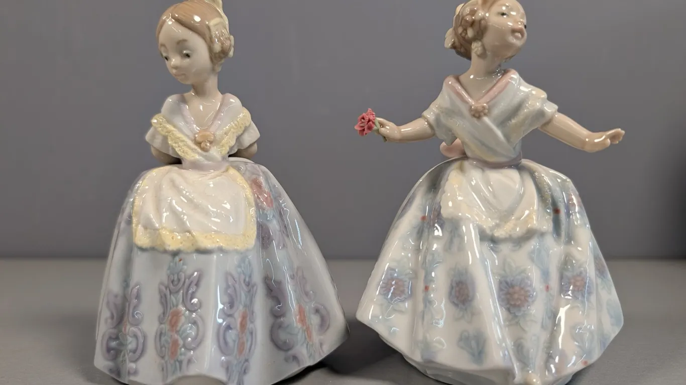 Lladro "A Moment's Pause" (3374) and "Girl with Flower" (3373) Porcelain Figurines
