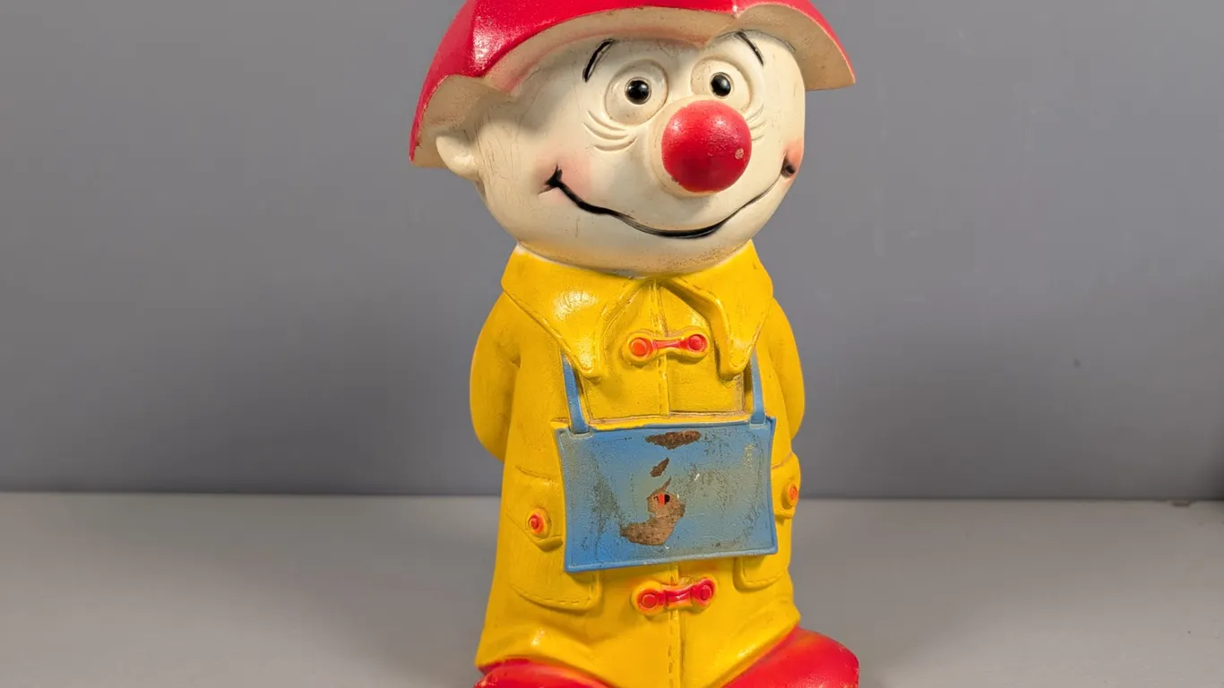 Vintage Raincoat Boy Coin Bank