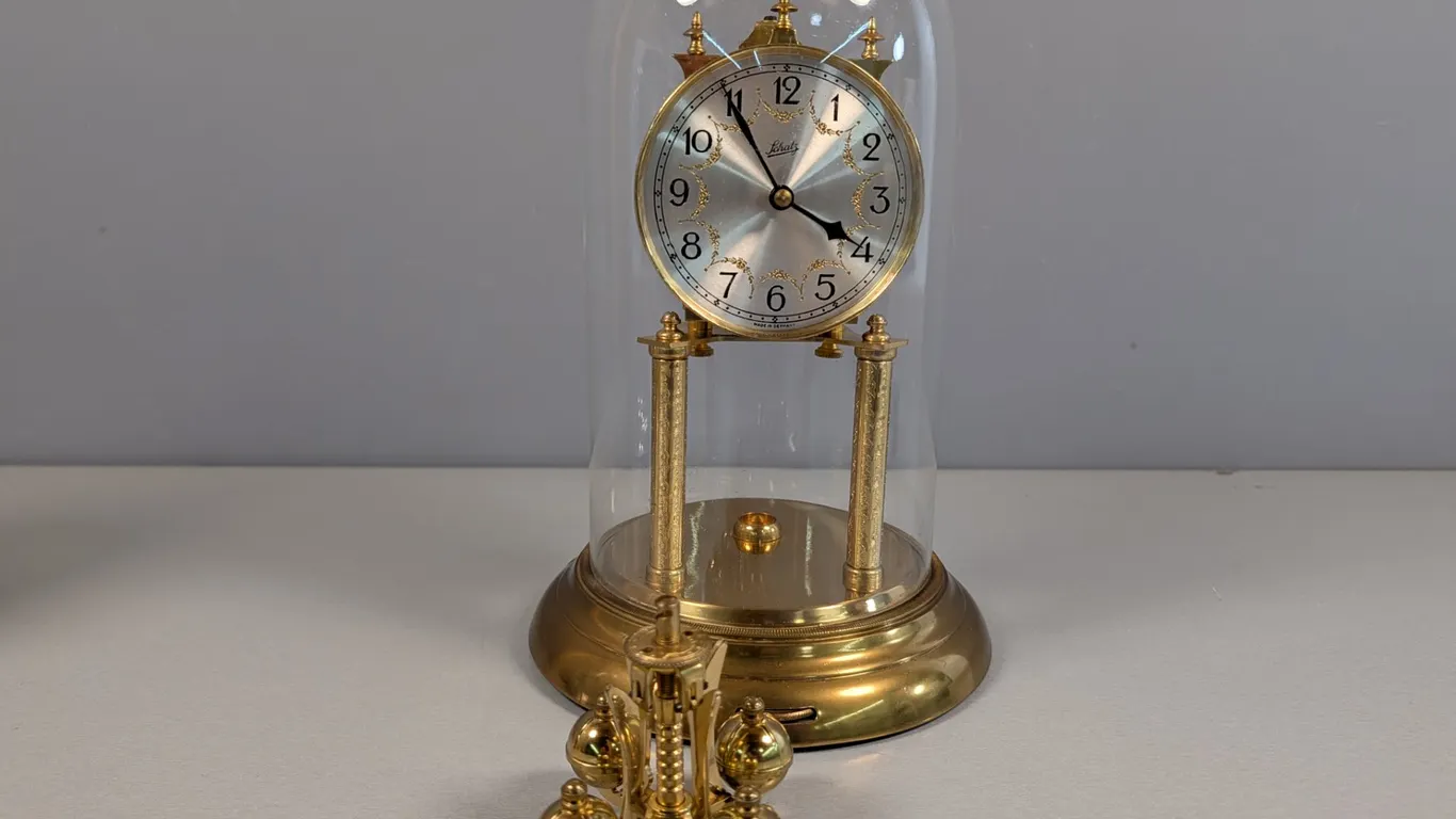 Schatz Brass Torsion Anniversary Clock with Glass Dome