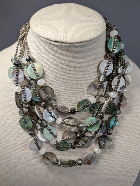 Multi-Strand Shell like disc accent and Beaded Statement Necklace
