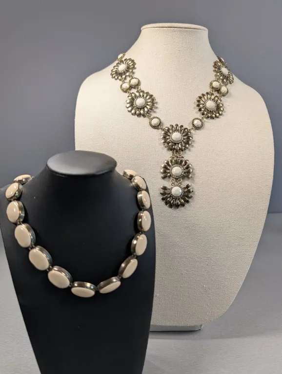 Two Statement Necklaces with Cream-Colored Accents