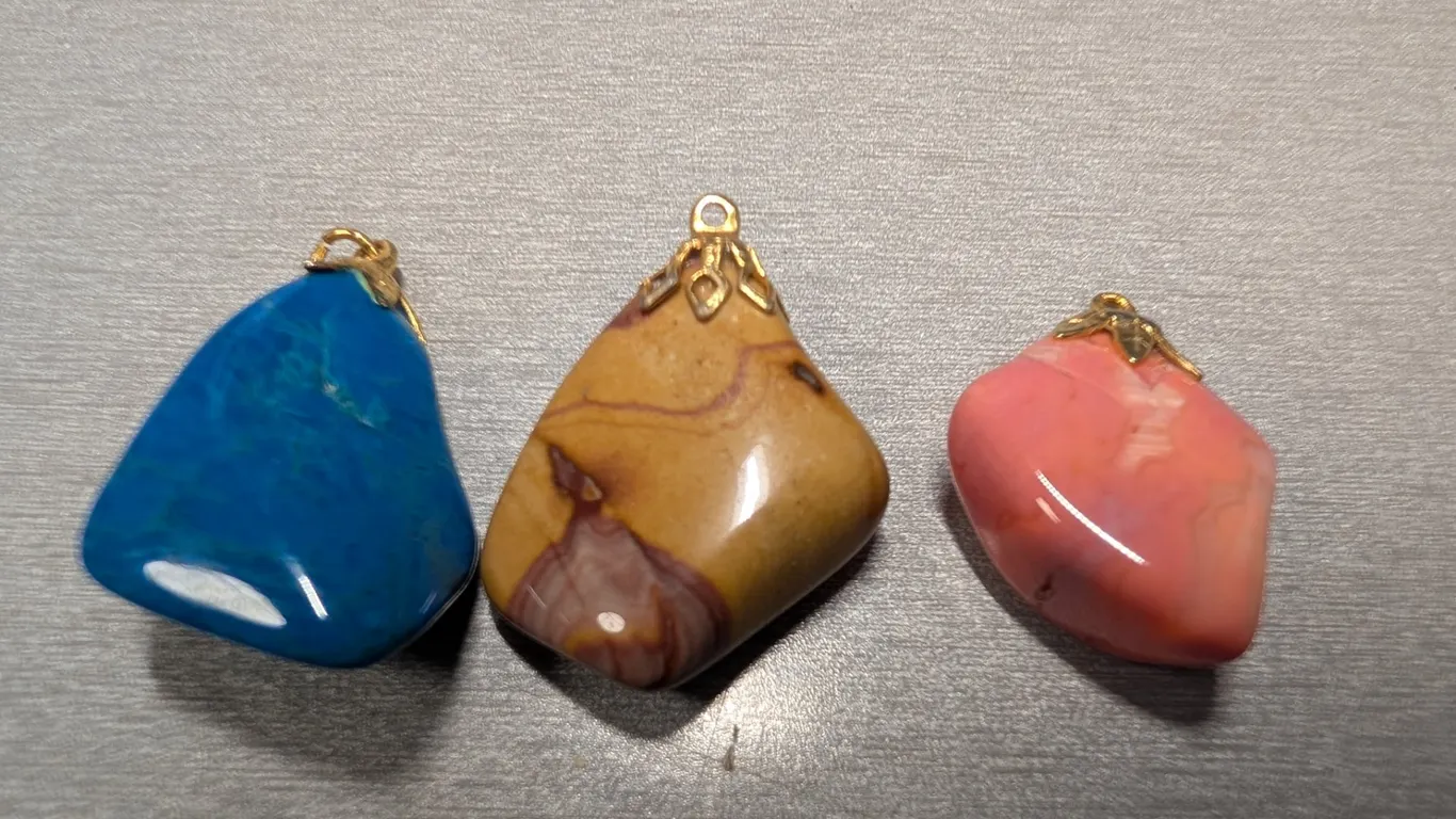 Three Assorted Stone Pendants